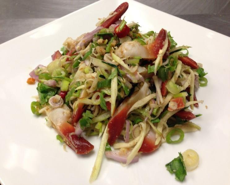 5 (Spicy salad mixed with mussels, squid and shrimp in lime juice, fish sauce, onions, jalapeno and bell peppers,