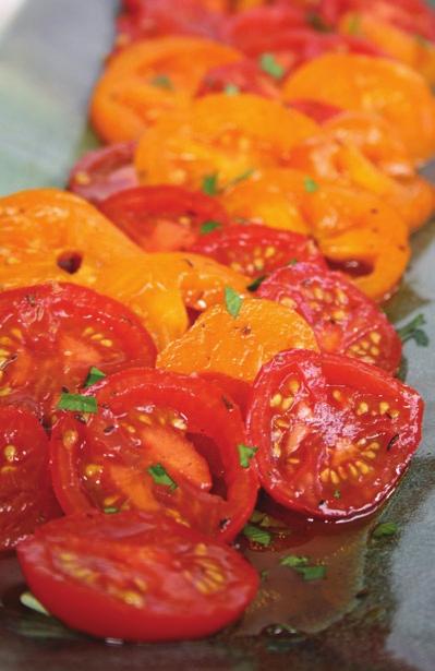 MARINATED TOMATO SALAD MARINATED TOMATO SALAD Slice. Slice the tomatoes and lay them in a dish that s deep enough to accommodate the marinade without it dribbling over the sides. Whisk.