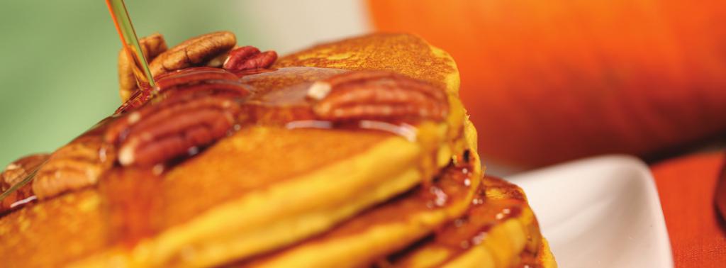 Whole Grain Pumpkin Pancakes Slightly sweet pancakes which are moist, fluffy and perfectly paired with toasted pecans and maple syrup.