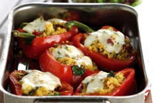 Stuffed Peppers with Couscous, Courgette & Mozzarella 4 red peppers, halved Olive oil Heaped tbsp butter 1 courgette, finely diced 110g (4oz) pack lemon and coriander couscous 85g (3oz) sun ripened