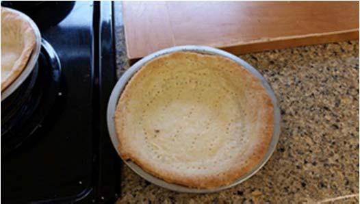 Picture 2: All lard pie crust after 30 minutes of baking at 425 degree Fahrenheit Picture 3:
