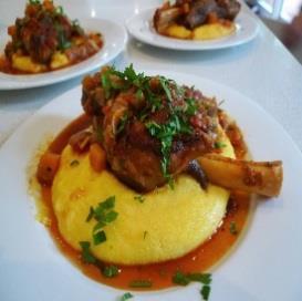 lamb shanks in red wine, tomato, mushrooms and onion served with duo potato torte Whole chicken breast parmigiana with shaved apple