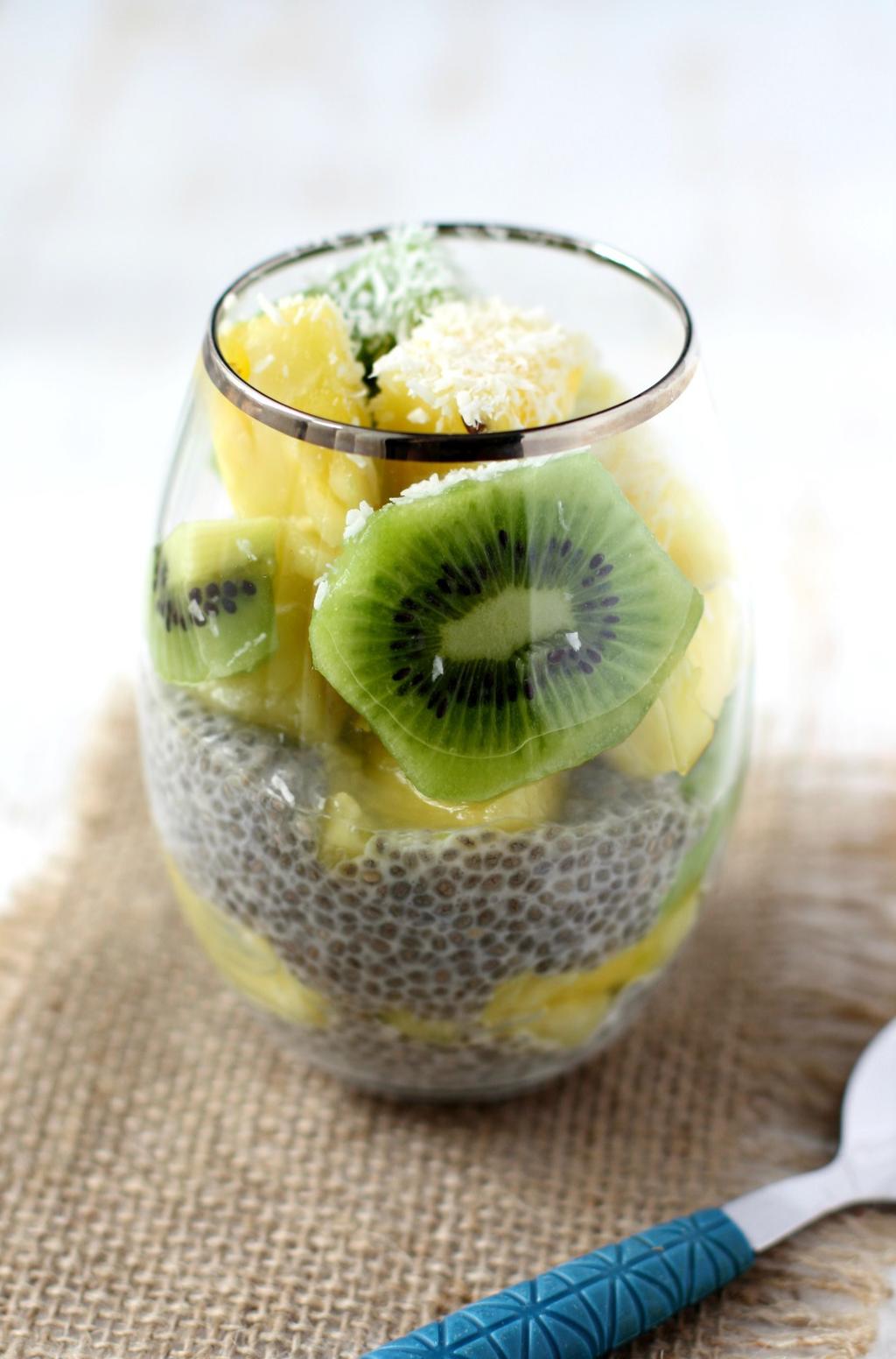 Tropical Chia Seed Pudding 1 cup unsweetened coconut milk beverage 5½ Tablespoons chia seeds 3 Tablespoons maple syrup 1½ teaspoons vanilla extract 2 kiwi fruit, sliced 1 cup pineapple, diced 2