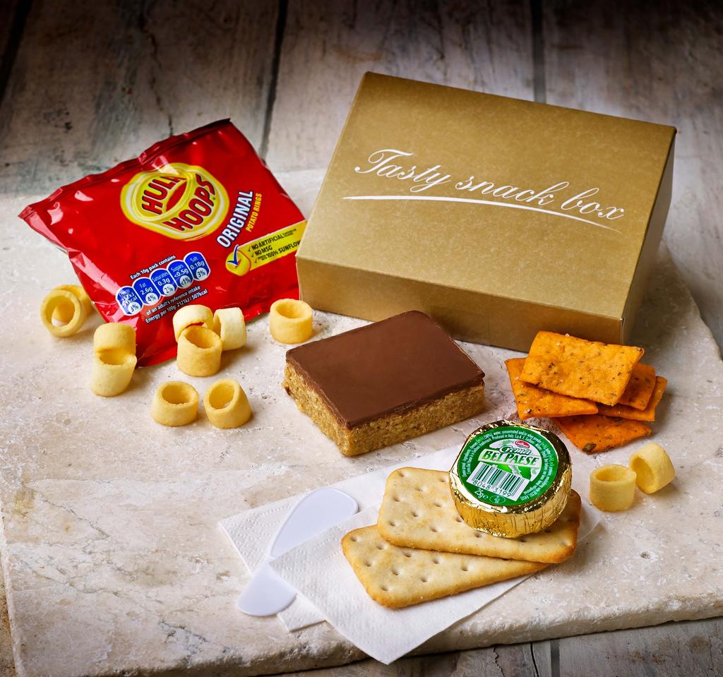Treat Yourself Whether you ve got a sweet tooth or fancy something savoury, you ll find a tasty treat from the trolley to tide you over until landing. Chocolate & Biscuits 1.