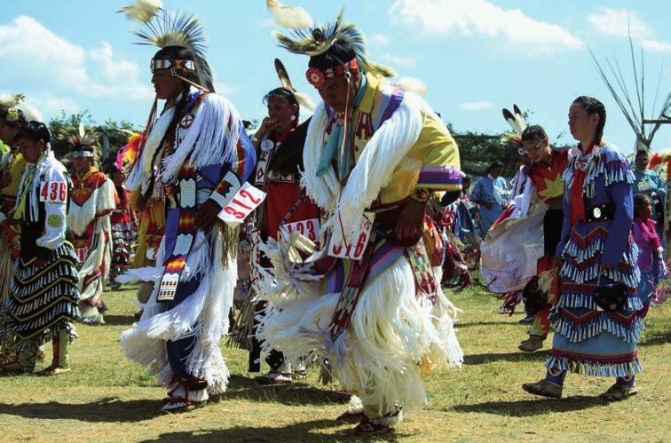 A moment from a pow-wow at a reservation in Montana (1994). language, music, dances and traditions alive with yearly pow-wows, which are big meetings of different peoples.