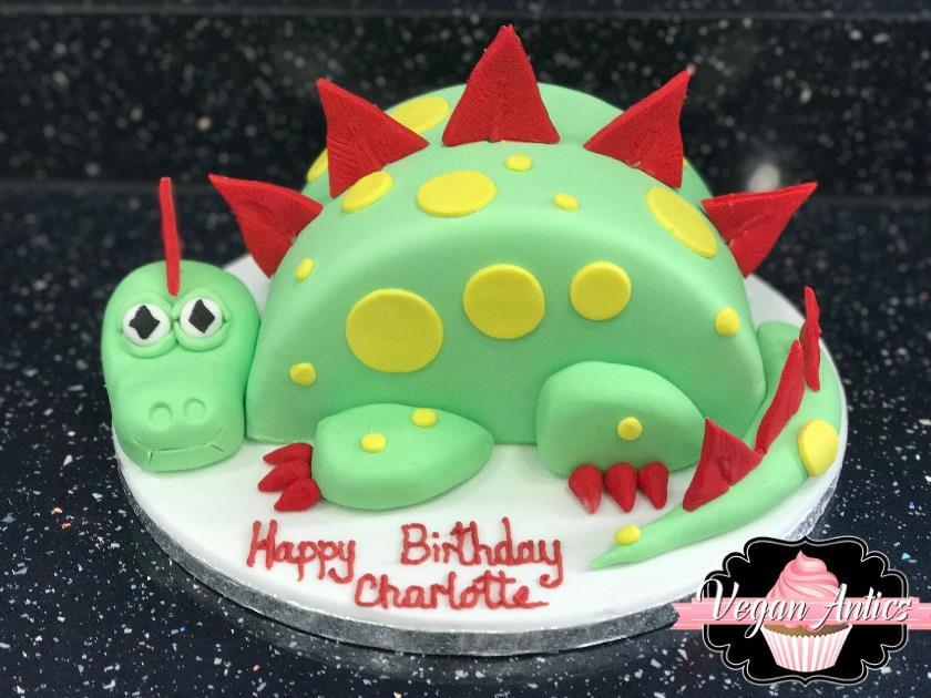 The body of the dinosaur is made with fluffy sponge cake, with the head and