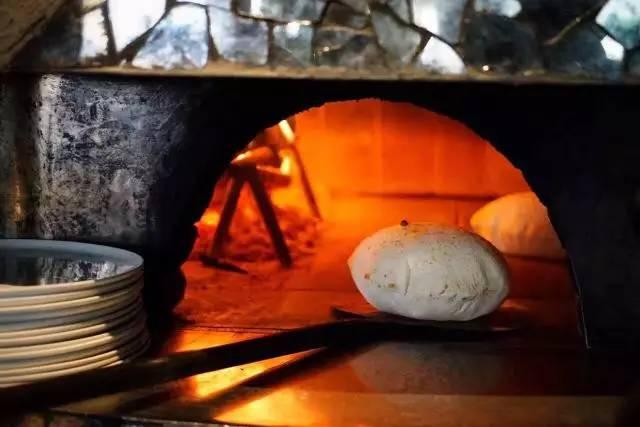 chefs not only have to pay attention to the disk they re kneading and tossing, they keep an eye on each pie going in and out of the fiery furnace (each pizza only bakes for an average of one minute
