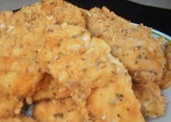 Breaded Chicken 6 skinless, boneless chicken breasts 2 cups sour cream 2 cups crushed cornflakes cereal Garlic salt 1 tsp Italian-style seasoning 6 tbs