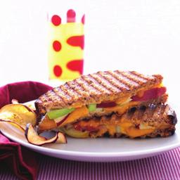 Apple-Cheddar Panini Serves 4 1. 8 slices whole-grain bread 2. ¼ cup low-fat honey mustard 3. 2 crisp apples, thinly sliced 4. 8 ounces low-fat Cheddar cheese, thinly sliced 5. Cooking Spray 1.