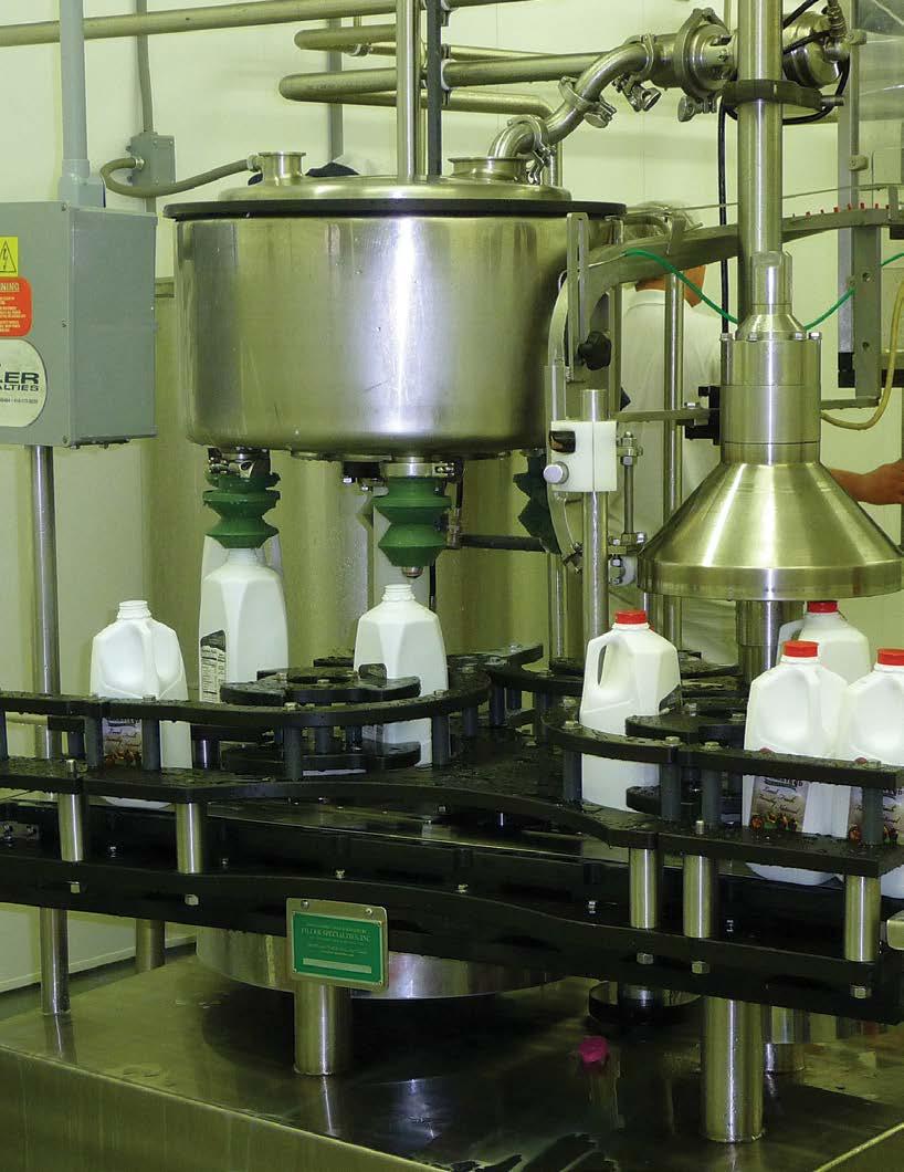 Dairy Processing At the Processing Plant Milk samples are tested in a lab to ensure that only the purest milk is used.