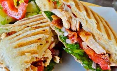 BACON & CHEDDAR CHICKEN WRAP Grilled Chicken Breast, Cheddar Cheese & Bacon (BBQ Sauce Upon Request) CALIFORNIA WRAP Fresh Roast Sliced Turkey, Lettuce, Tomato, Onion and American Cheese CAESAR WRAP