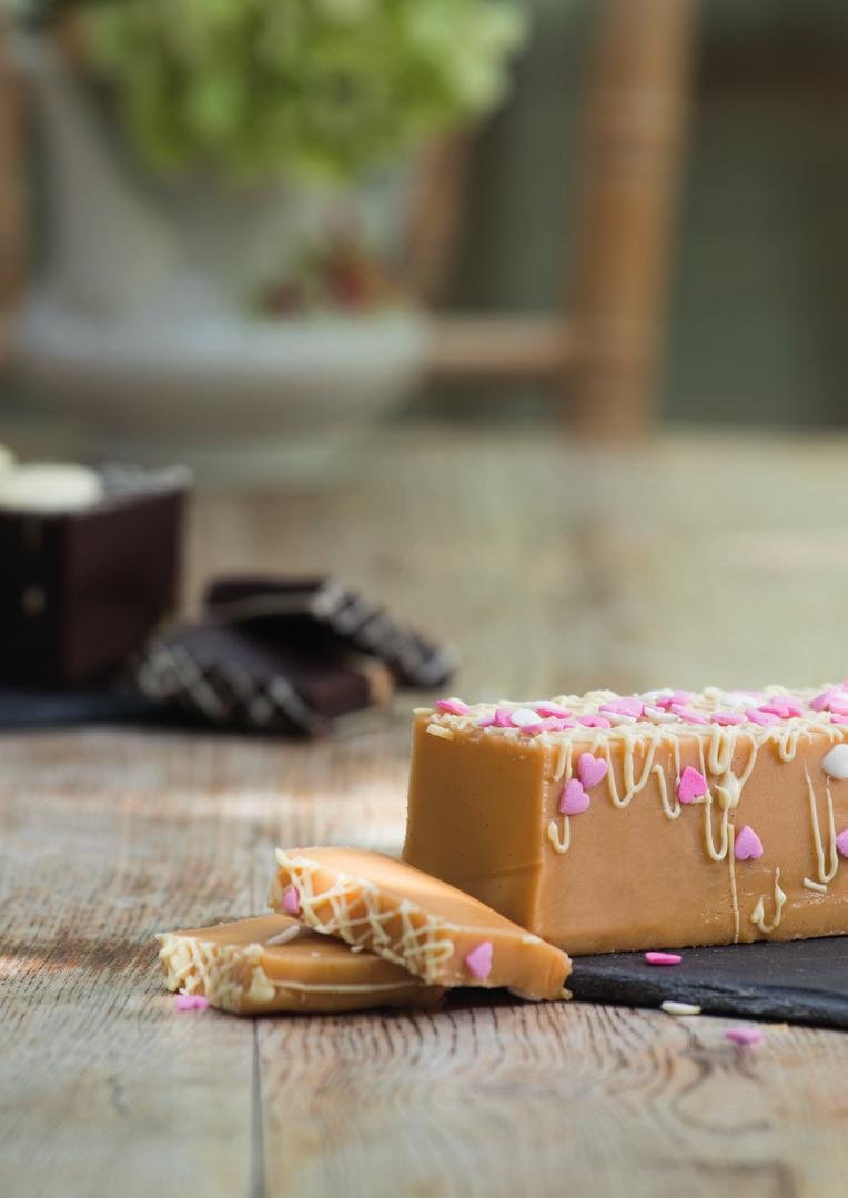 Sweet Table Fudge Loaves RRP inc vat 25.00 Fudge loaves are 850g e exquisitely decorated, Dimensions H275 x W55 x D63 mm designed to be sliced and served, they make impressive table pieces.