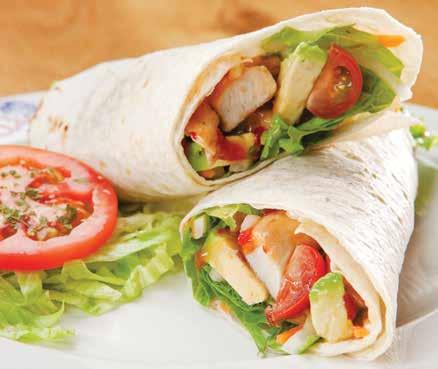 CHICKEN 269 Grilled chicken breast strips with a sweet chilli dressing, guacamole, lettuce, julienne carrots and cherry tomatoes rolled up in a lightly toasted tortilla.