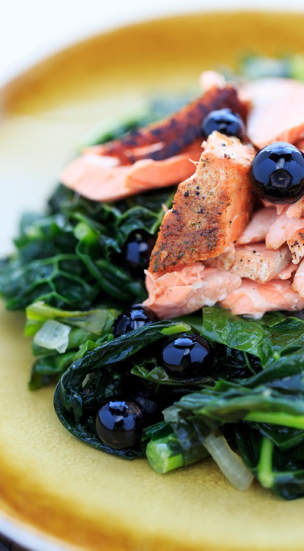 ROASTED SALMON WITH BLUEBERRIES 4 SERVINGS 1½ to 2 pounds filet of wild salmon 3 tablespoons extra-virgin olive oil 1 lemon 2 cloves garlic 1 pint fresh blueberries (or approximately 2 cups frozen