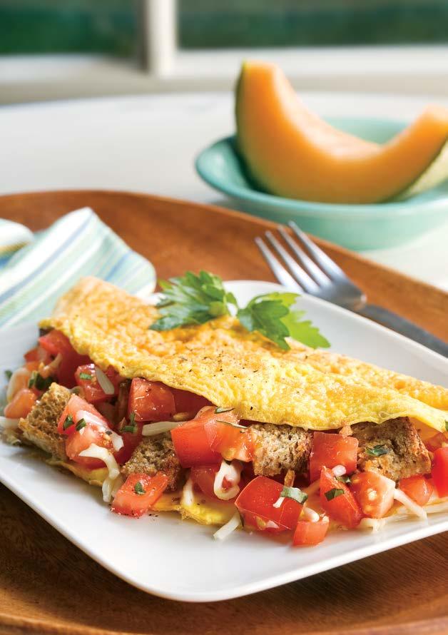 Tomato and Garlic Omelet This unique omelet includes vegetables and whole wheat bread for a balanced breakfast.