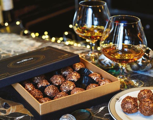 Set of 6 crystal wine glasses 145.00 - Set of 6 crystal champagne flutes 155.00 Cognac Chocolate Truffles This decadent black box with gold detailing is filled with 25 handmade truffles.