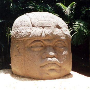 Scientists have found large stone heads carved by the Olmecs. This one is nearly nine feet tall. The earliest known civilization in the Americas were the Olmecs.