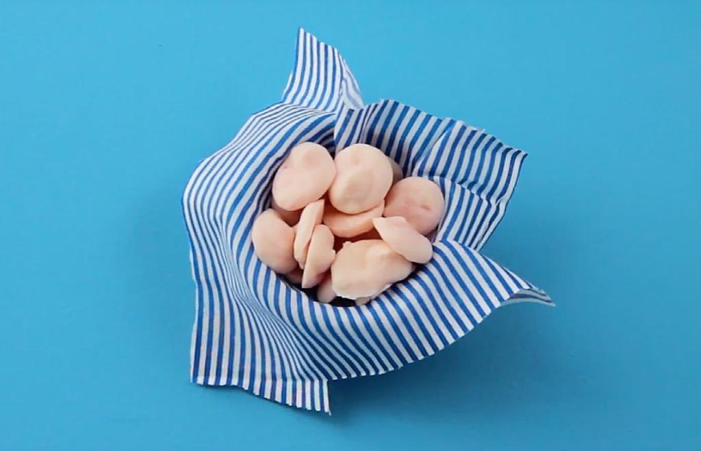 Yoghurt Buttons Yoghurt Berry juice Piping bag or snaplock sandwich bag Scissors Baking paper Leftover buttons can be transferred into a container or bag, and kept in the freezer.