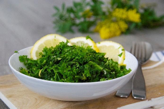 Sautéed Greens with Garlic and Parsley [Serves 2] 1 tablespoon of ghee 3 cloves of finely chopped garlic juice and zest of one lemon 1 bunch dark, leafy greens such as kale or collard greens 1/2 cup