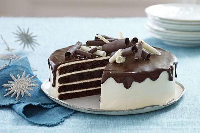 36. TUXEDO CAKE Small amount of vegetable shortening and flour for preparing pans Batter: 4 cups granulated sugar 1 cup unsweetened