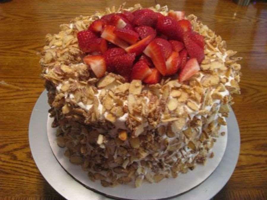56. MUCHAS LECHES CAKE Batter: 16 ounces (about 4 cups) blanched almonds 1¼ cups plus ½ cup granulated sugar,