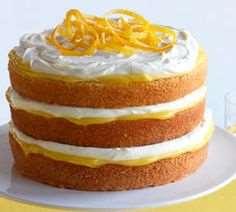 57. NAKED WHITE LAYER CAKE Small amount of vegetable shortening and flour for preparing pans Cake Batter: 3 cups sifted cake flour 4 teaspoons baking powder ¾