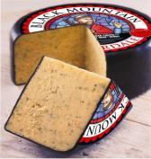 This blended Welsh Cheddar is speckled with wholegrain mustard seeds that literally pop on the palate.