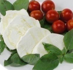 The exterior of the cheese is pasta filata which we know as mozzarella. The interior is filled with fresh cream and shavings of fresh mozzarella.