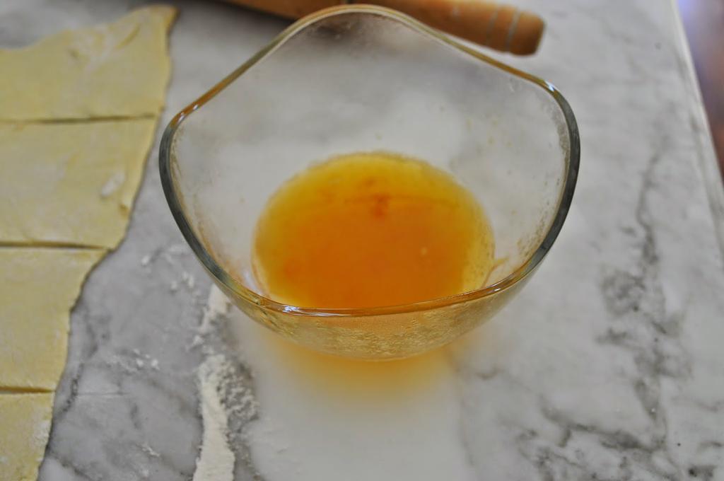 In a bowl, place three tablespoons of apricot preserve with two