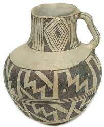 black-on-white pottery with elaborate designs.