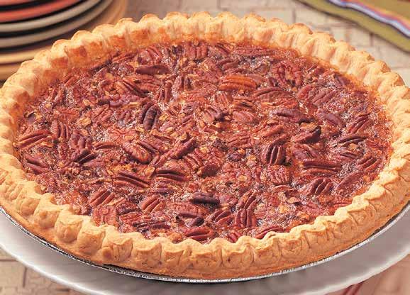 a rich, mouth-watering pecan filling in a flaky crust topped with pecan halves.