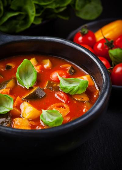 Chunky Garden Soup Lunch Serves: 4 25g Parmesan, grated 1 tbsp Olive Oil 1 Onion, chopped 1-2 Parsnips, in chunks 2 Garlic Cloves, crushed 2 Courgettes, thickly sliced 100g Cherry Tomatoes, halved