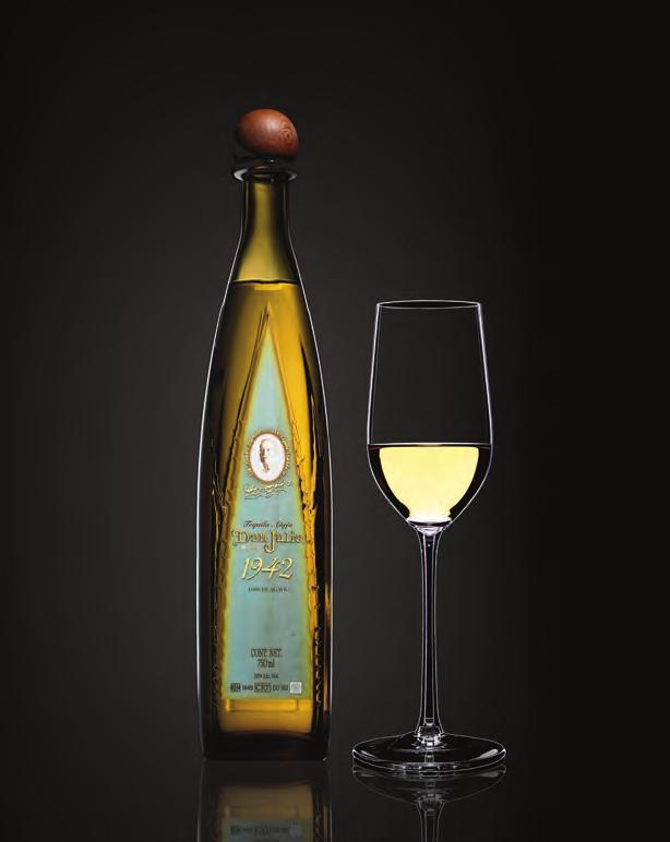 DON JULIO 1942 A tribute tequila of astonishing depth, Tequila Don Julio 1942 is presented in an elongated bottle intricately designed after the agave leaf.