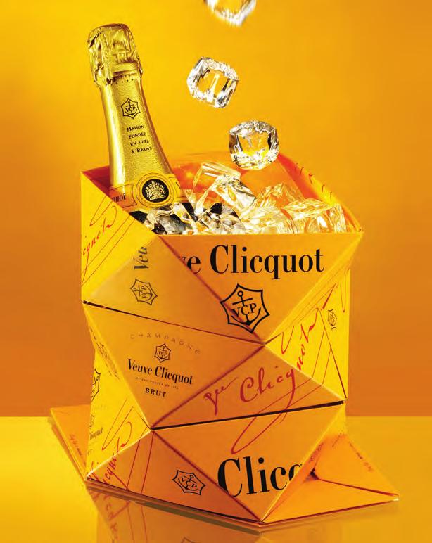 VEUVE CLICQUOT WITH BUCK ET CLIC UP Clicq Up is the first foldable champagne bucket, a collaboration between the creative power of Veuve Clicquot and Belgian designer Mathias Van de Walle.