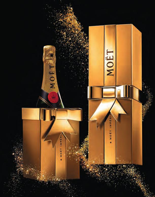 MOËT & CHANDON THE GIFT BOX Experts in the art of celebrating, Moët & Chandon present The Gift, an exclusive gold gift box.