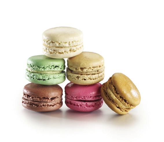 Gourmet coffee break & petits fours Mixed macarons Made of almond paste, eggs and sugar.