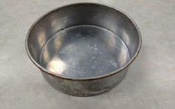 Circular pan, typically used for cake