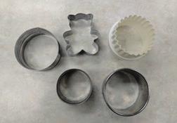 Cookie cutters are used to portion cookies or biscuits into a