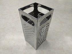 Grater for grating hard ingredients such as