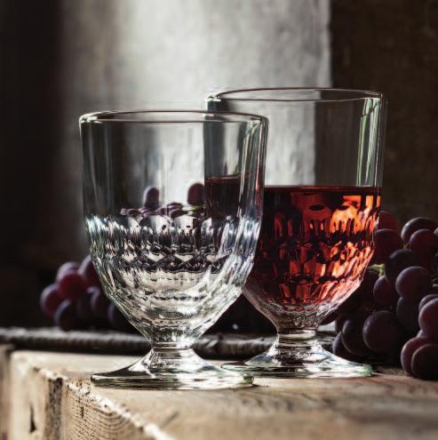 these glasses have a classic goblet shape, intricate raised floral pattern,