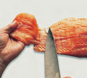 How is filleting flatfish different from filleting round fish? Figure 4.5 Cutting escalopes of salmon.