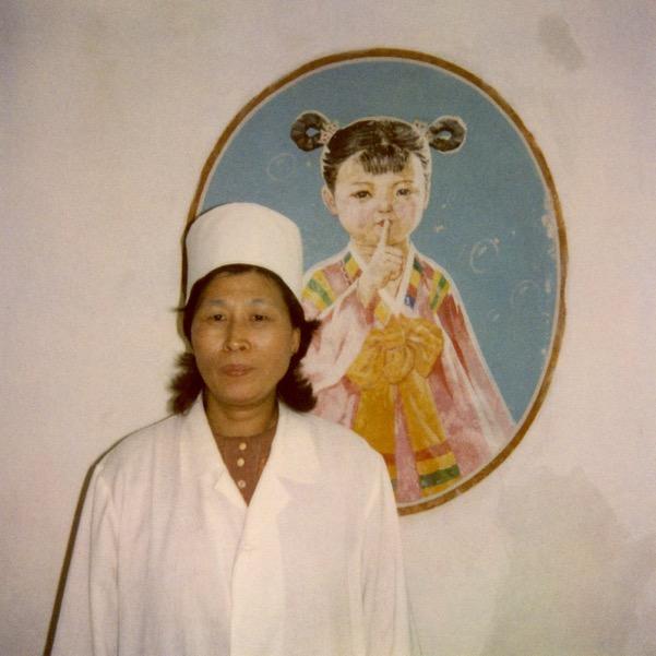 Photo taken during a visit in a kindergarten of Hamhung, a lady