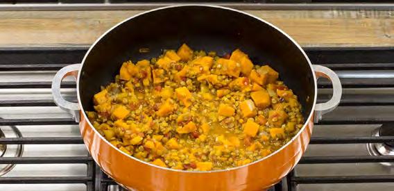 Lower heat and simmer for about 30 minutes or until lentils and sweet potatoes are