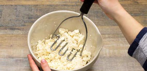 Mash in a bowl with a potato masher; set aside.