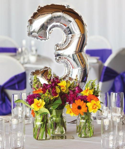 balloon table number (in silver or gold), white or black lycra chair covers with a choice of  Option 4 A round vase filled with a