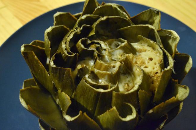 drizzling) Rinse artichokes well, tugging leaves outward to loosen slightly for stuffing. Trim off stems so artichokes sit on a flat surface. Trim off the pointed tips of each leaf. Set aside.
