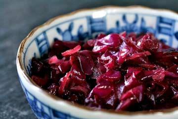 Sweet and Sour Red Cabbage 1/4 cup (1/2 stick) butter 1 2-lb red cabbage, thinly sliced (~12 cups) 6 Tbsp