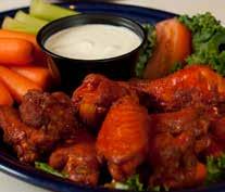 49 Maple Ale Glazed Wings: Our signature oven-roasted chicken wings enhanced with Smugglers own Prohibition Ale and Vermont maple syrup glaze. Served with ranch dressing and celery sticks. $12.