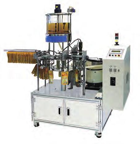 SPOUT FILLING & CAPPING MACHINE (For Center) The Spout filling & Capping machines range for filling and capping premade pouches with center spout as well as gusset bags with spout that has been