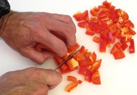 - Cut and remove the root and stem ends from the shallot.